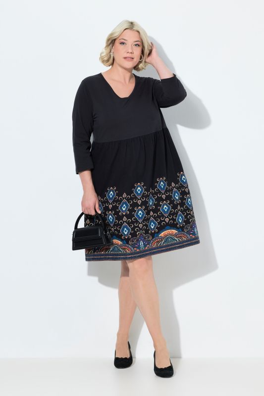 Opulent Border Print Empire Knit Pocket Dress