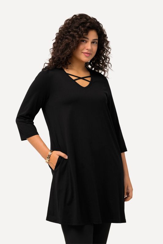 Criss Cross V-Neckline Swing Knit Tunic