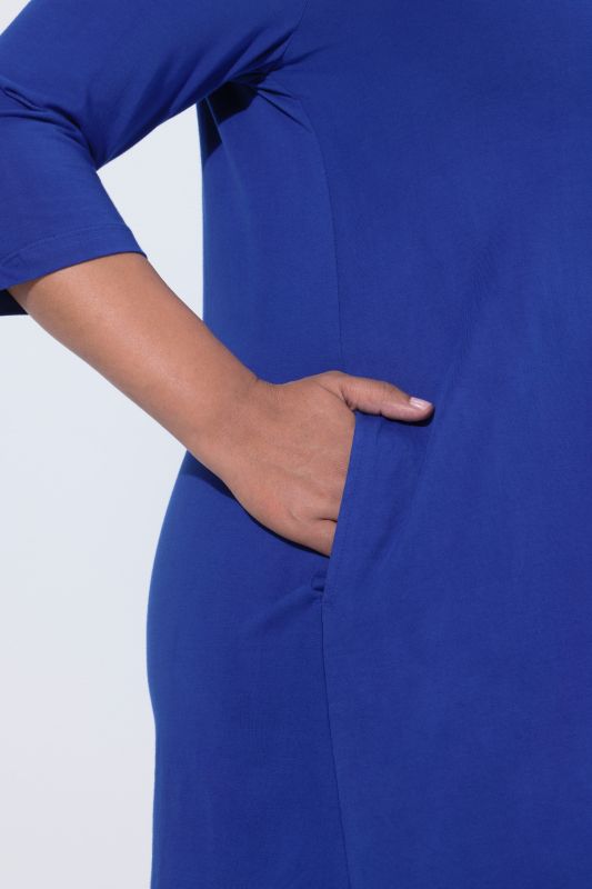 Criss Cross V-Neckline Swing Knit Tunic