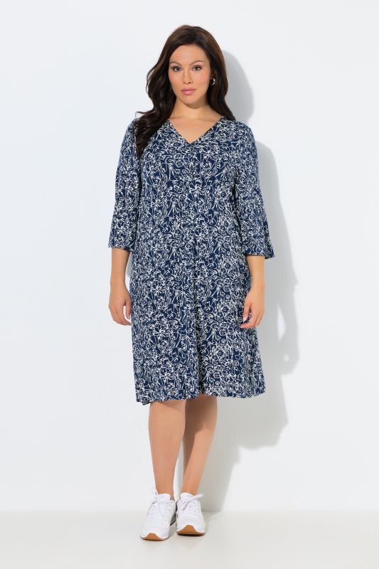 Рокля с надписи и цветя