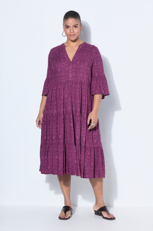 Рокля с волани на ръкавите и полата