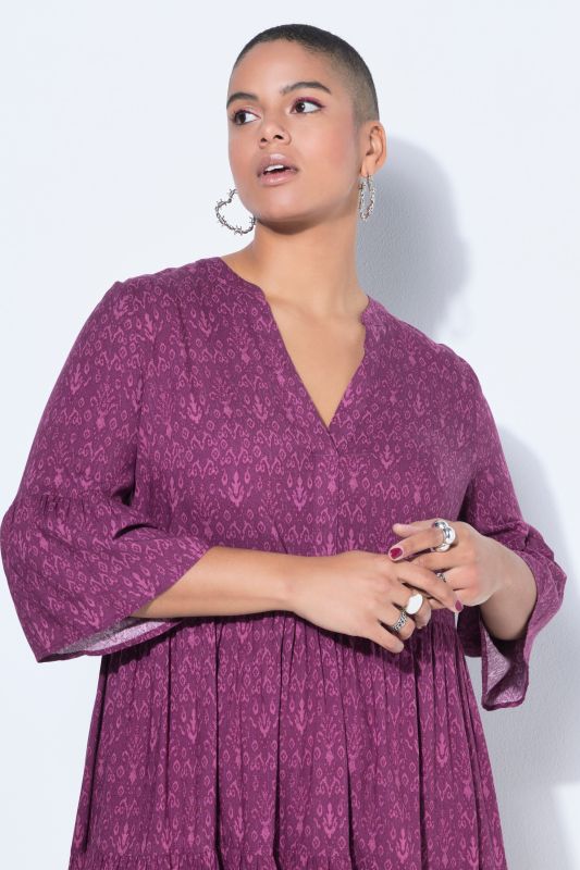 Рокля с волани на ръкавите и полата