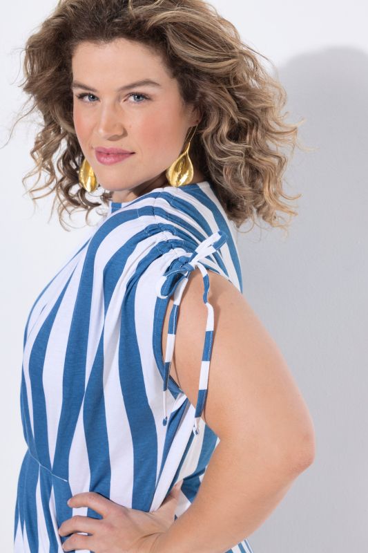 Туника с раиран принт