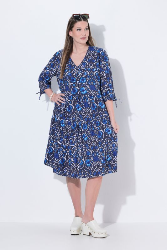 Рокля с принт на цветя и джобове