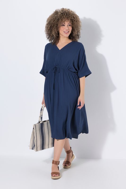 Рокля с акцент на талията