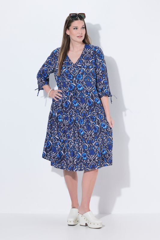 Рокля с принт на цветя и джобове